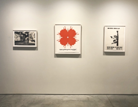 Installation view of three posters by Jack Youngerman.  Red and black graphics
