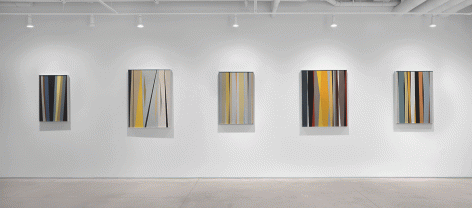 Five paintings by Alice Trumbull Mason installed in the Washburn Gallery comprised of vertical stripes in ochers, grays, blues, blacks, whites, and reds.